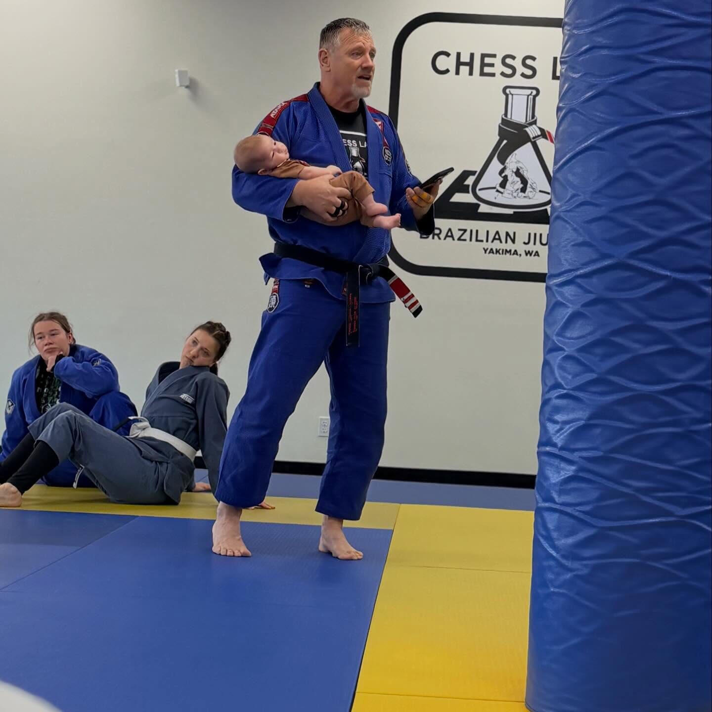 Professor O'Neal showing our youngest recruit a few tips.