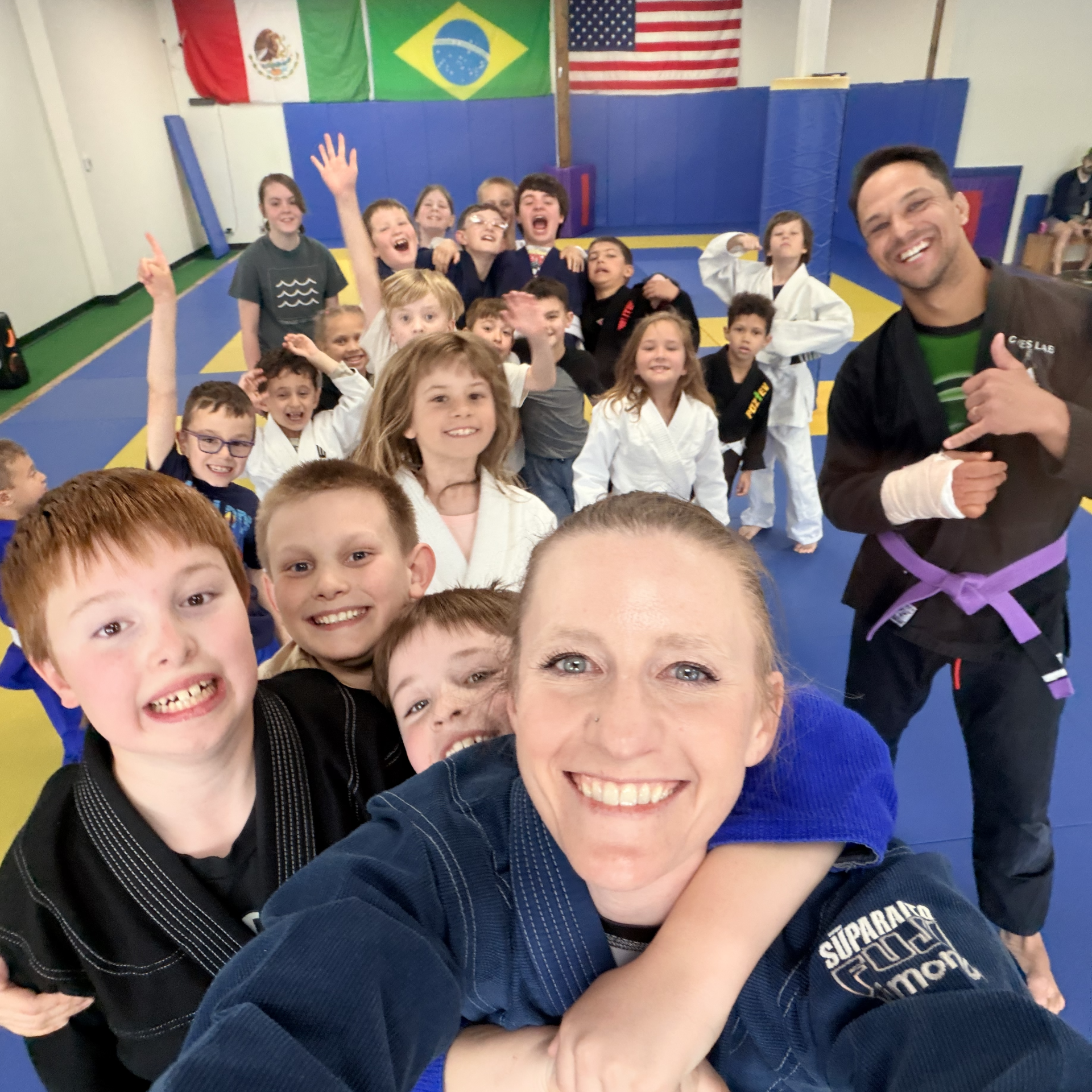 selfie kids jiu jitsu coach jen and ari